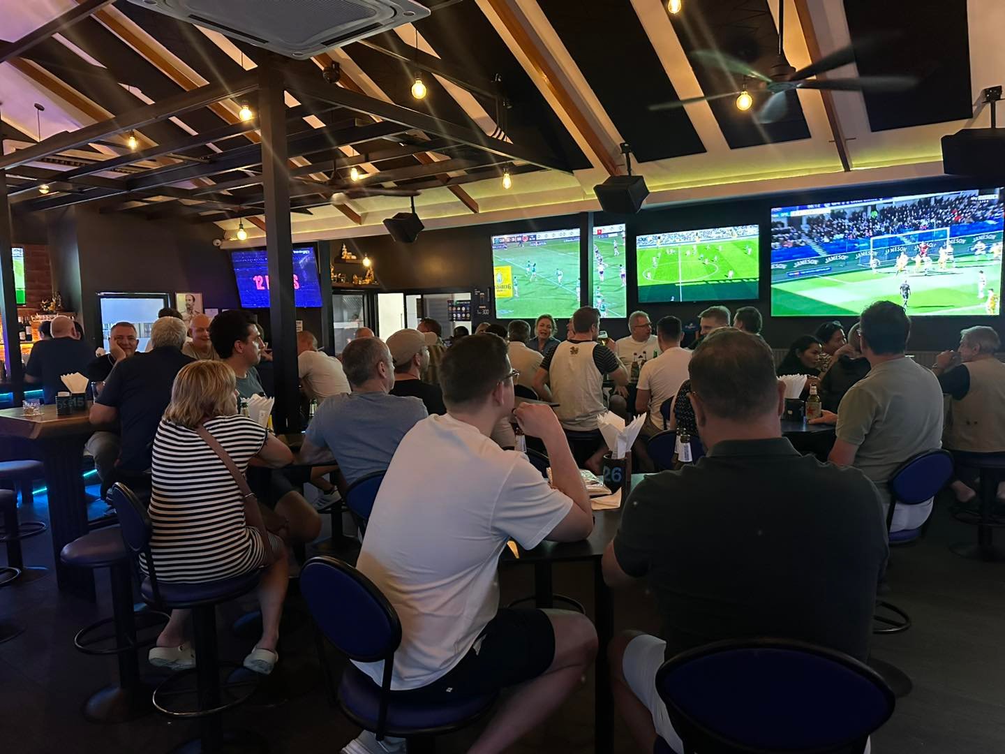 A full house at Sports on 20 watching a match on the big screens