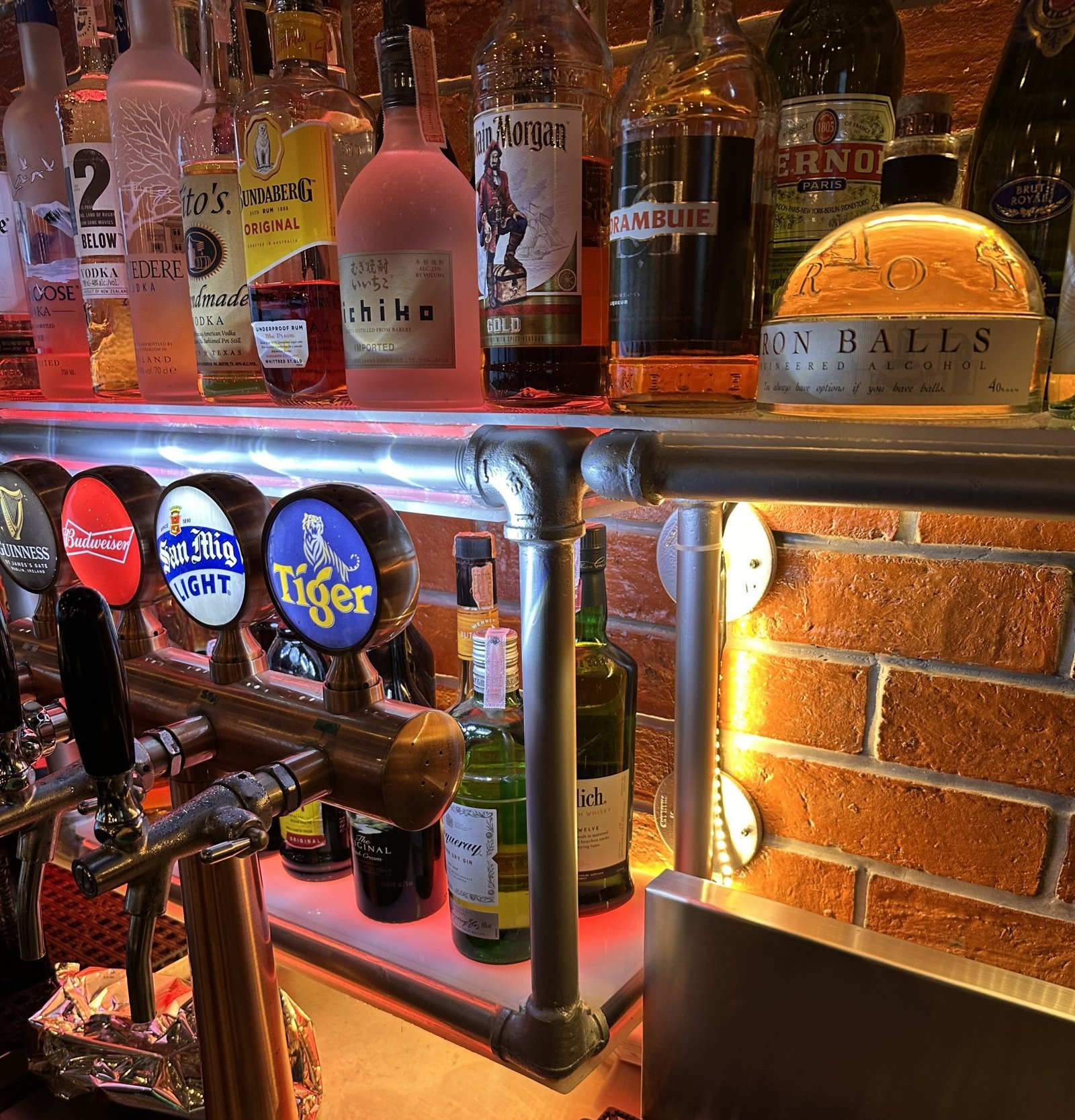Beer taps and the back bar at Sports on 20